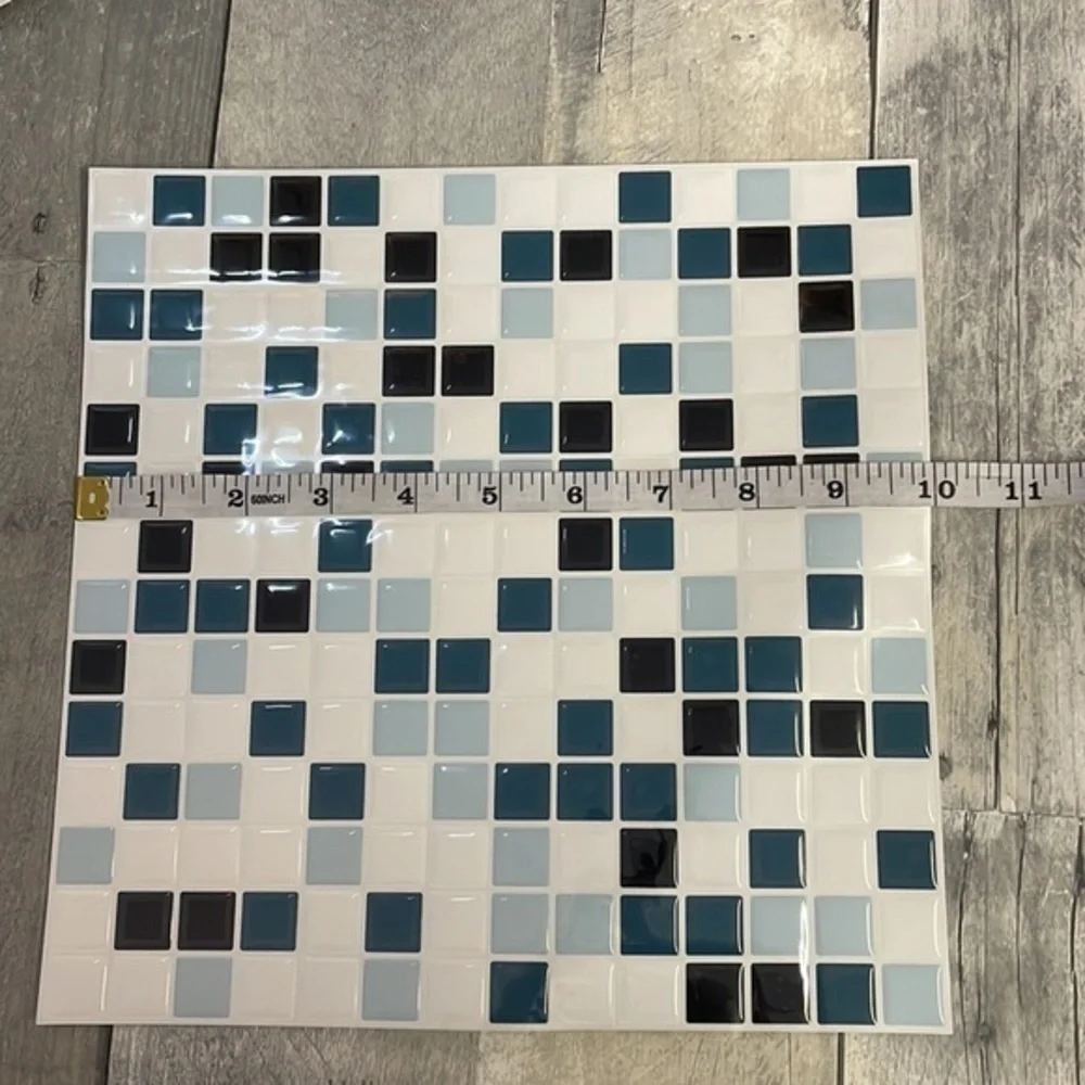 SELF-ADHESIVE 3D wall tiles. New in package.  10x10. 6 tiles. White, blue, black